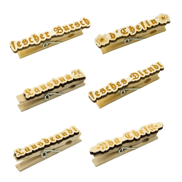 Freche Sprüche auf Holzklammern: Perfekte Trachtenaccessoires